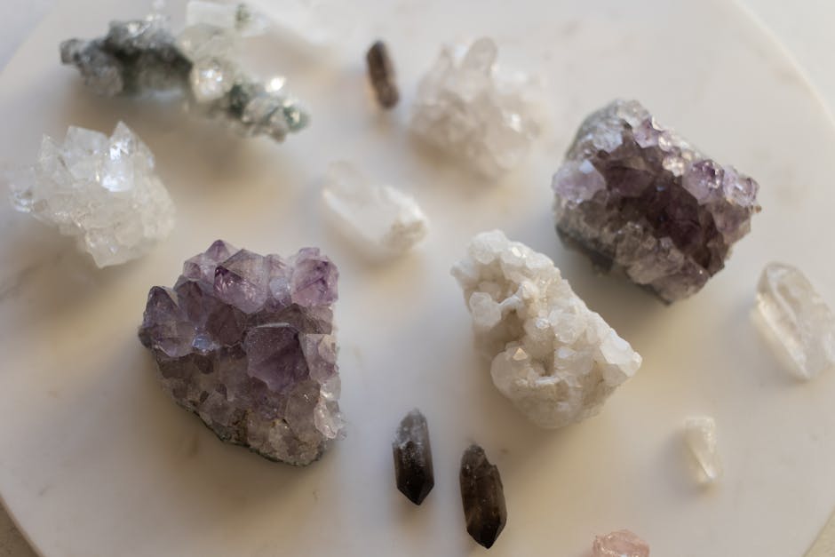 Healing crystals placed near electronics for EMF protection in a home workspace